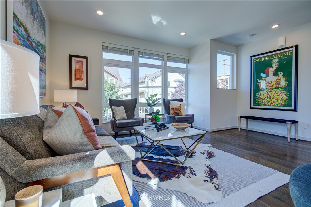 4262 Linden Avenue North Seattle, WA 98103 - Photo 24 of 40 a living room with furniture and large window