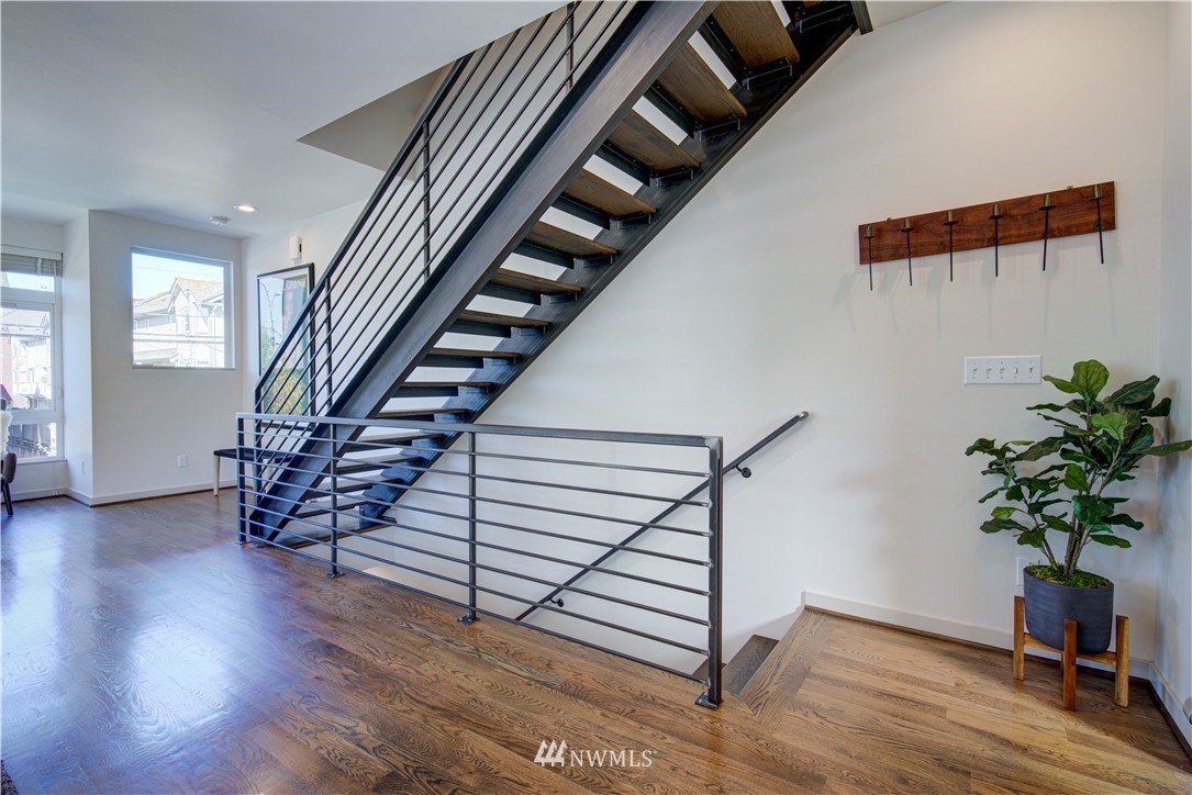 4262 Linden Avenue North Seattle, WA 98103 - Photo 27 of 40 a view of entryway with wooden floor