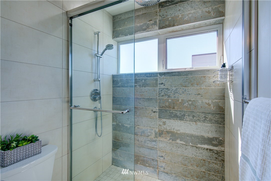 4262 Linden Avenue North Seattle, WA 98103 - Photo 30 of 40 a bathroom with a shower