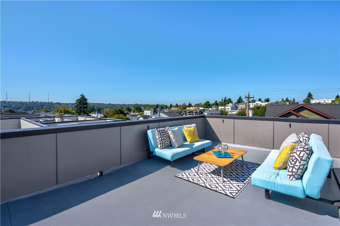 4262 Linden Avenue North Seattle, WA 98103 - Photo 37 of 40 a view of swimming pool with seating space