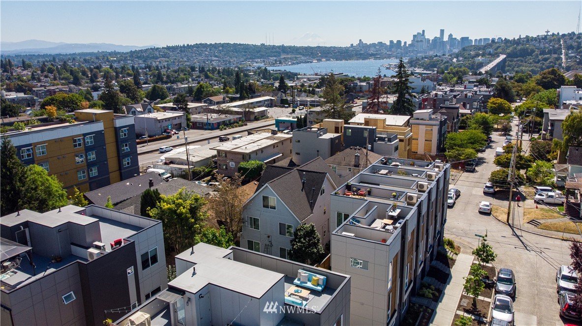 4262 Linden Avenue North Seattle, WA 98103 - Photo 38 of 40 an aerial view of a city with lots of residential buildings