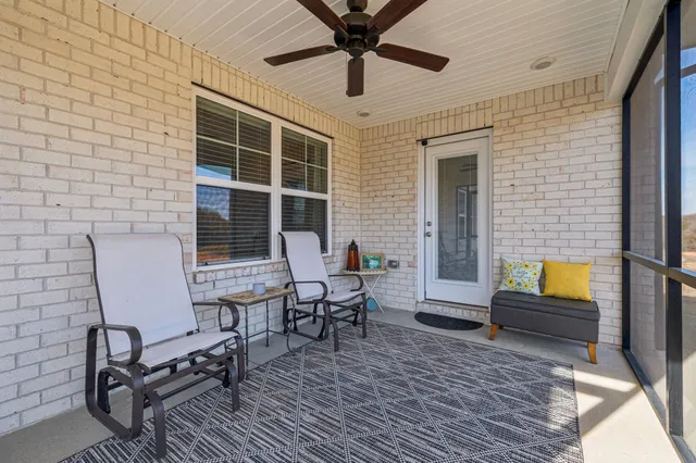 a view of a living room and entry way