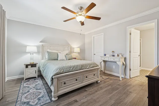 a bathroom with double vanity sinks and a mirror