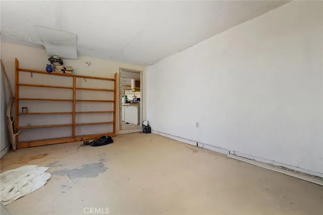 a front view of a house with outdoor seating