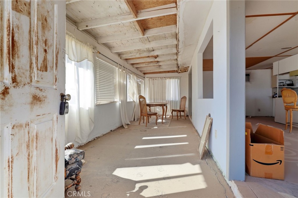 83626 Carey Road Twentynine Palms, CA 92277 - Photo 15 of 30 a view of entryway and hall with wooden floor