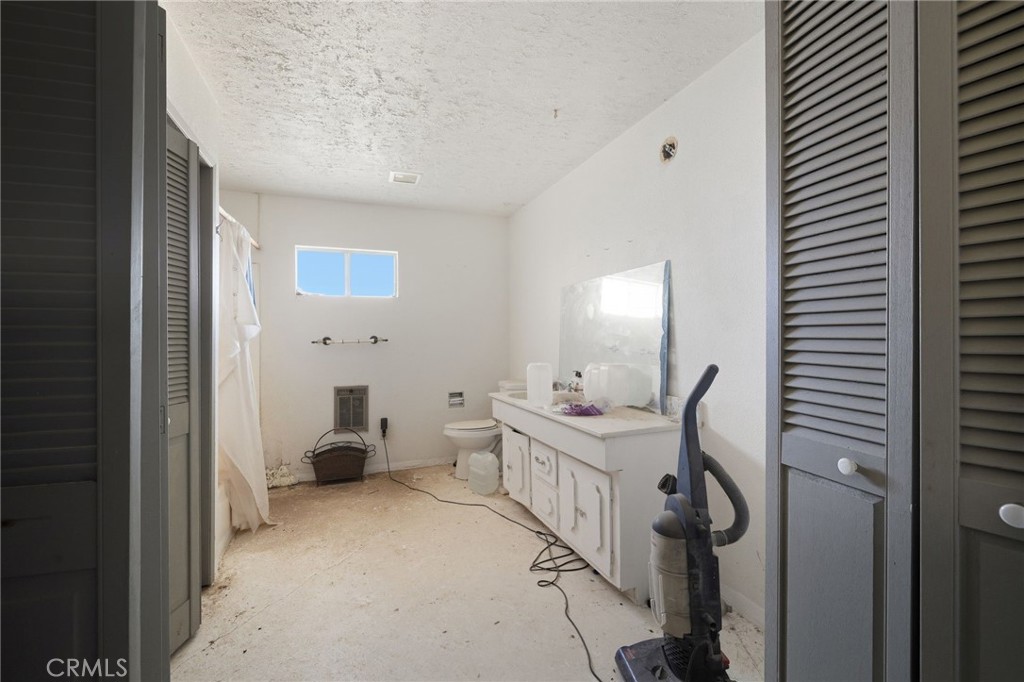 83626 Carey Road Twentynine Palms, CA 92277 - Photo 27 of 30 a bathroom with a sink and a mirror