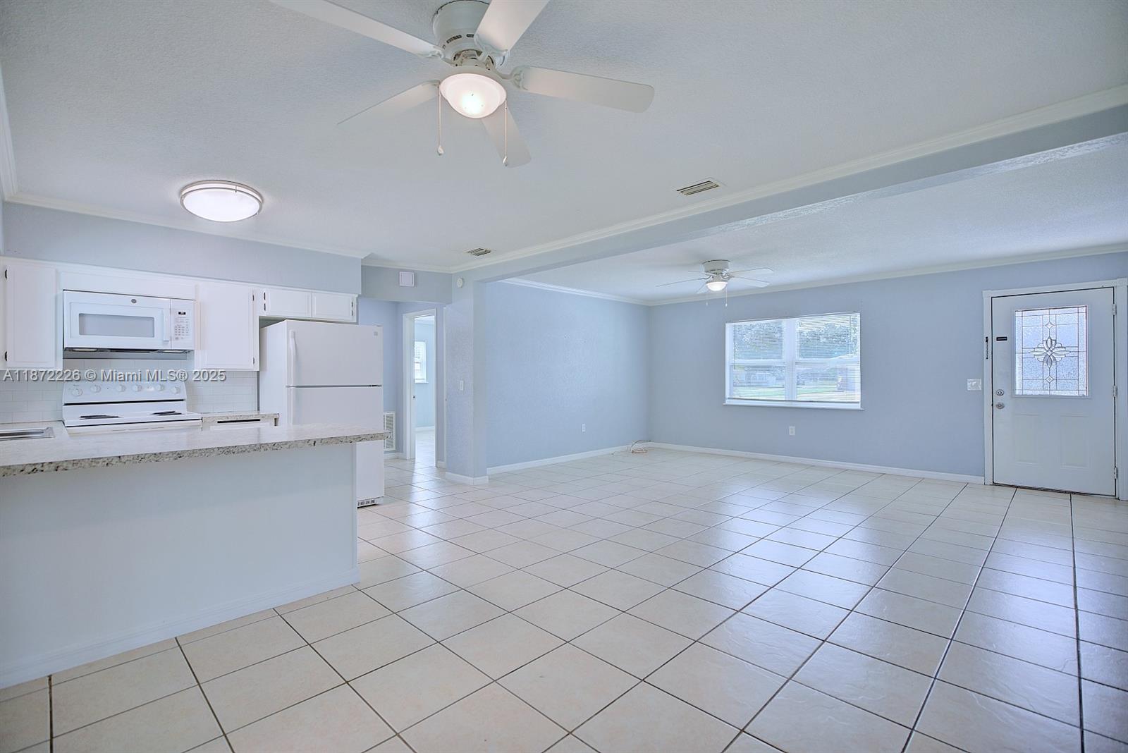 3308 Austin Street Sebring, FL 33872 - Photo 14 of 33 a view of a kitchen with electric appliances