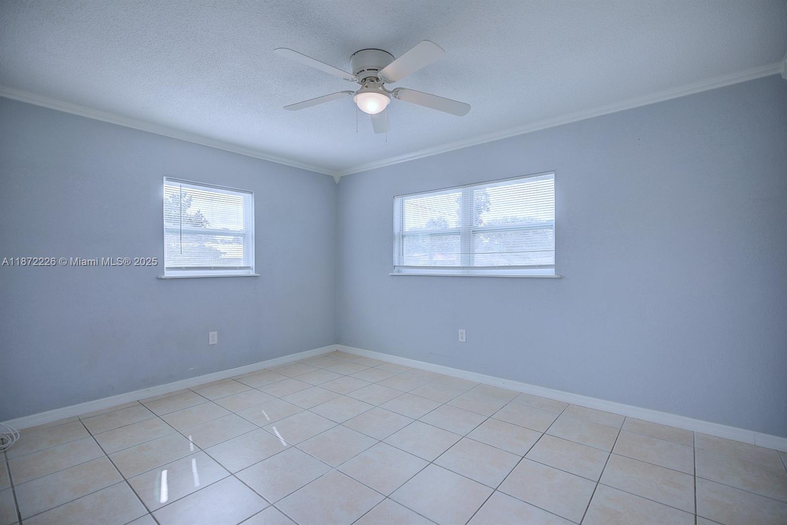 3308 Austin Street Sebring, FL 33872 - Photo 18 of 33 a view of an empty room with a window