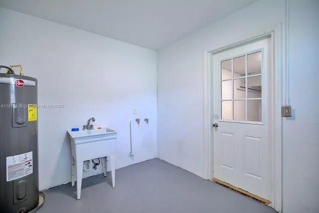 a room that has a bed and a desk in it