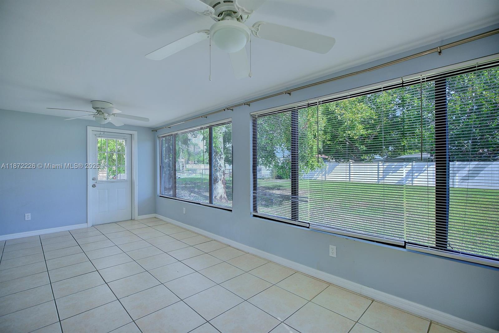 3308 Austin Street Sebring, FL 33872 - Photo 26 of 33 a view of an empty room with a window