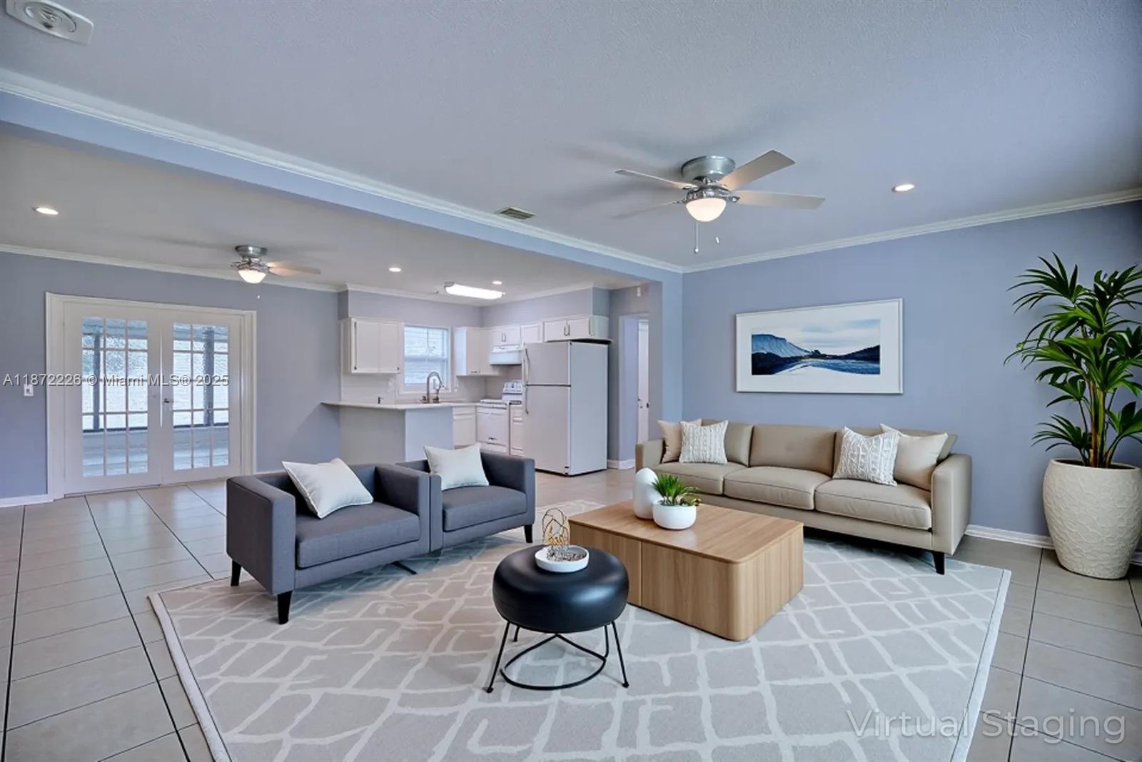3308 Austin Street Sebring, FL 33872 - Photo 4 of 33 a living room with furniture potted plant and kitchen view