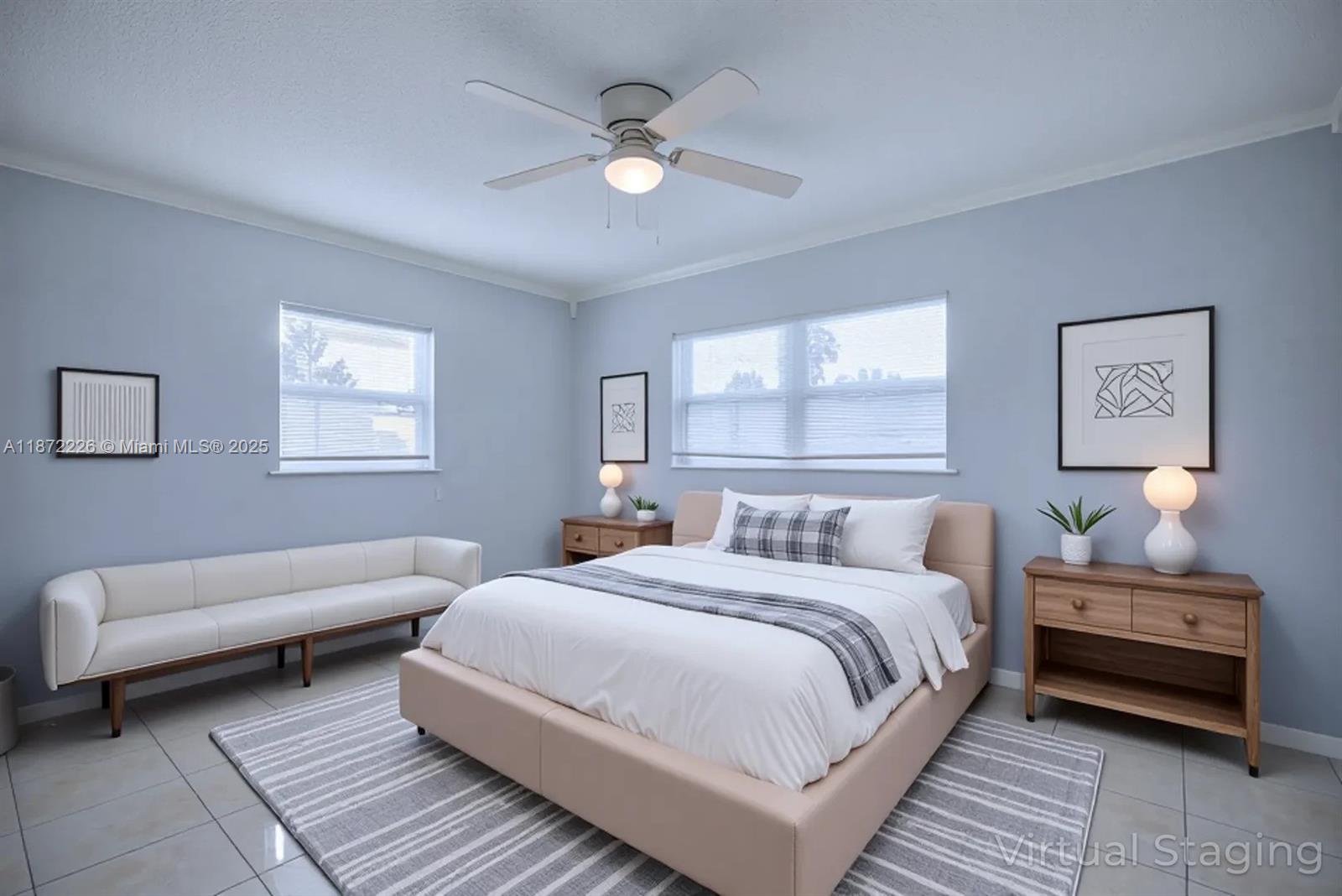 3308 Austin Street Sebring, FL 33872 - Photo 7 of 33 a bedroom with a bed and a couch