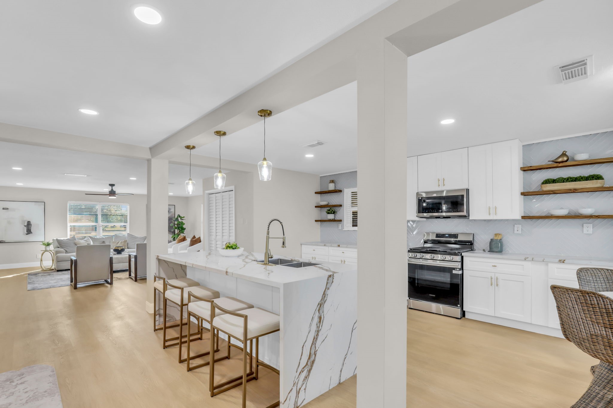 12106 Giusti Lane Santa Fe, TX 77510 - Photo 12 of 33 a kitchen with stainless steel appliances kitchen island granite countertop a sink and cabinets