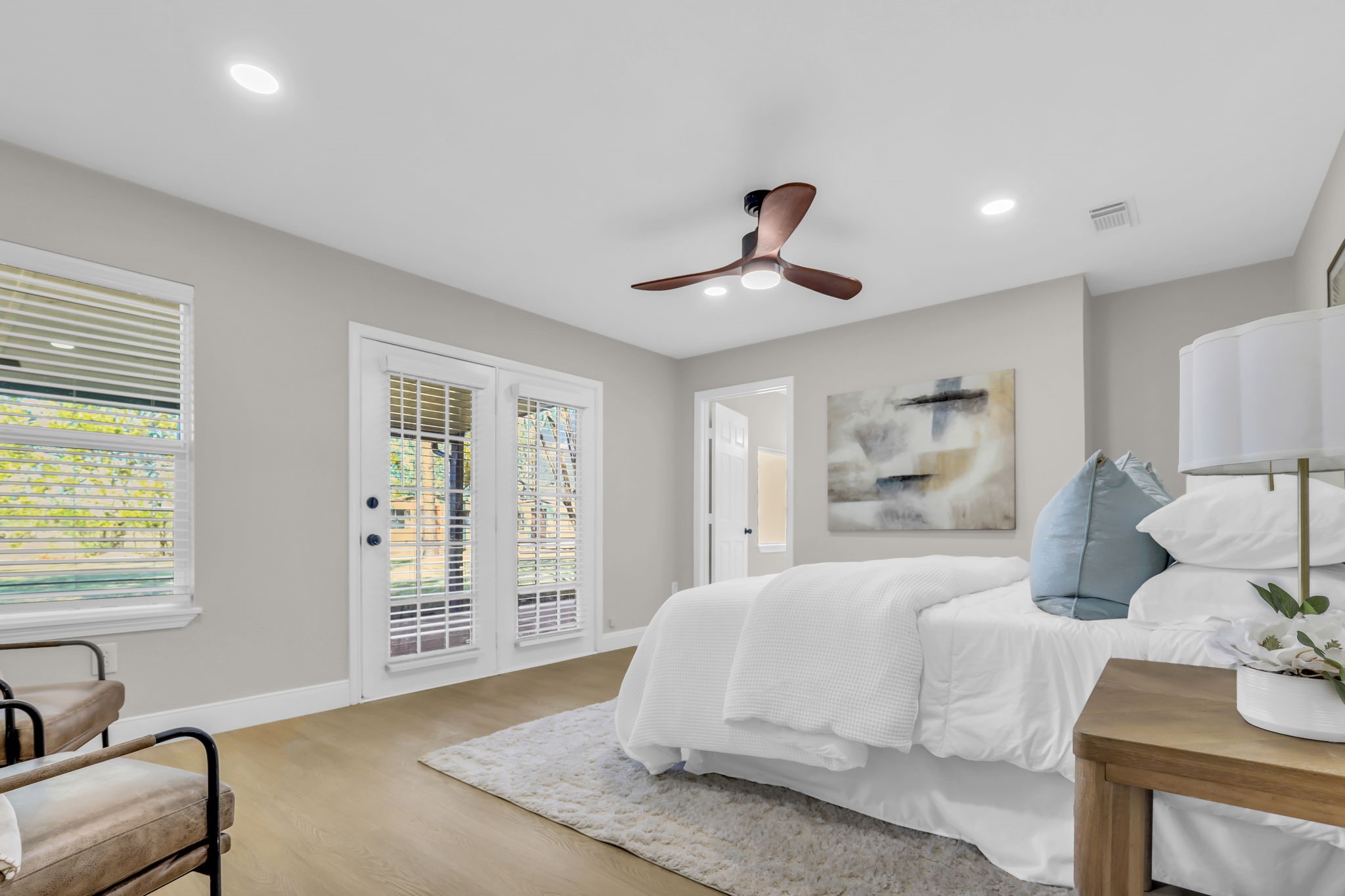 12106 Giusti Lane Santa Fe, TX 77510 - Photo 19 of 33 a spacious bedroom with a large bed and a couch