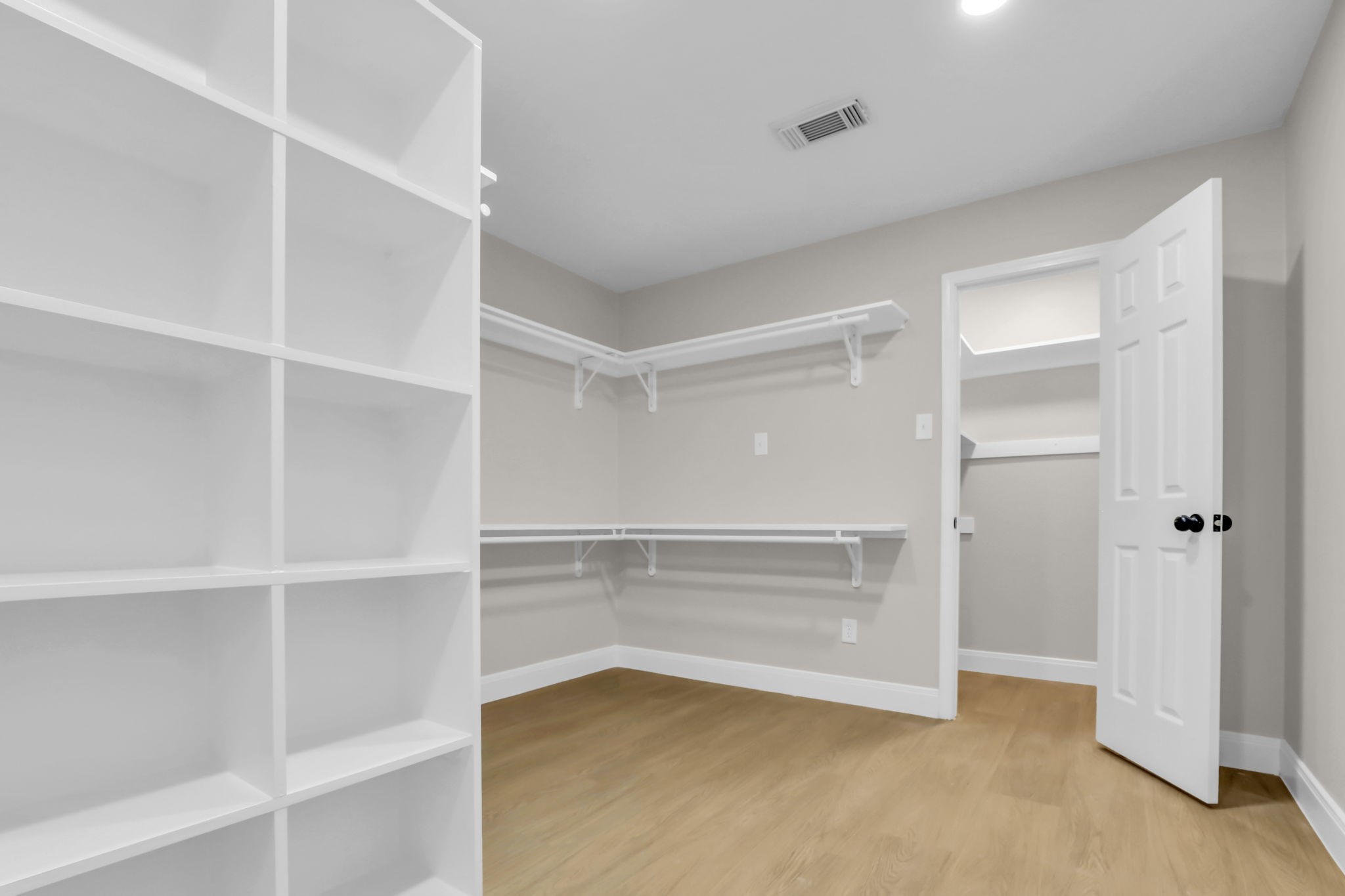 12106 Giusti Lane Santa Fe, TX 77510 - Photo 24 of 33 a view of an empty walk in closet