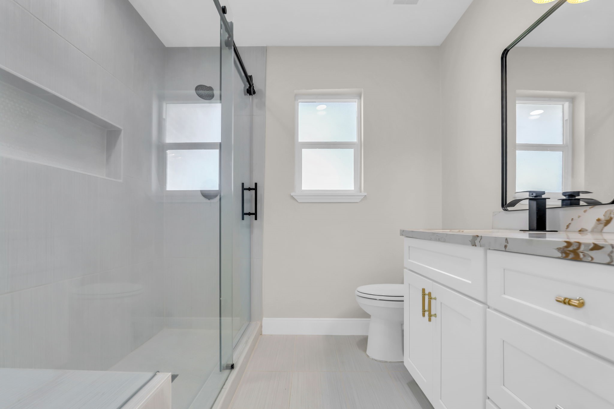 12106 Giusti Lane Santa Fe, TX 77510 - Photo 26 of 33 a bathroom with a sink a toilet and shower