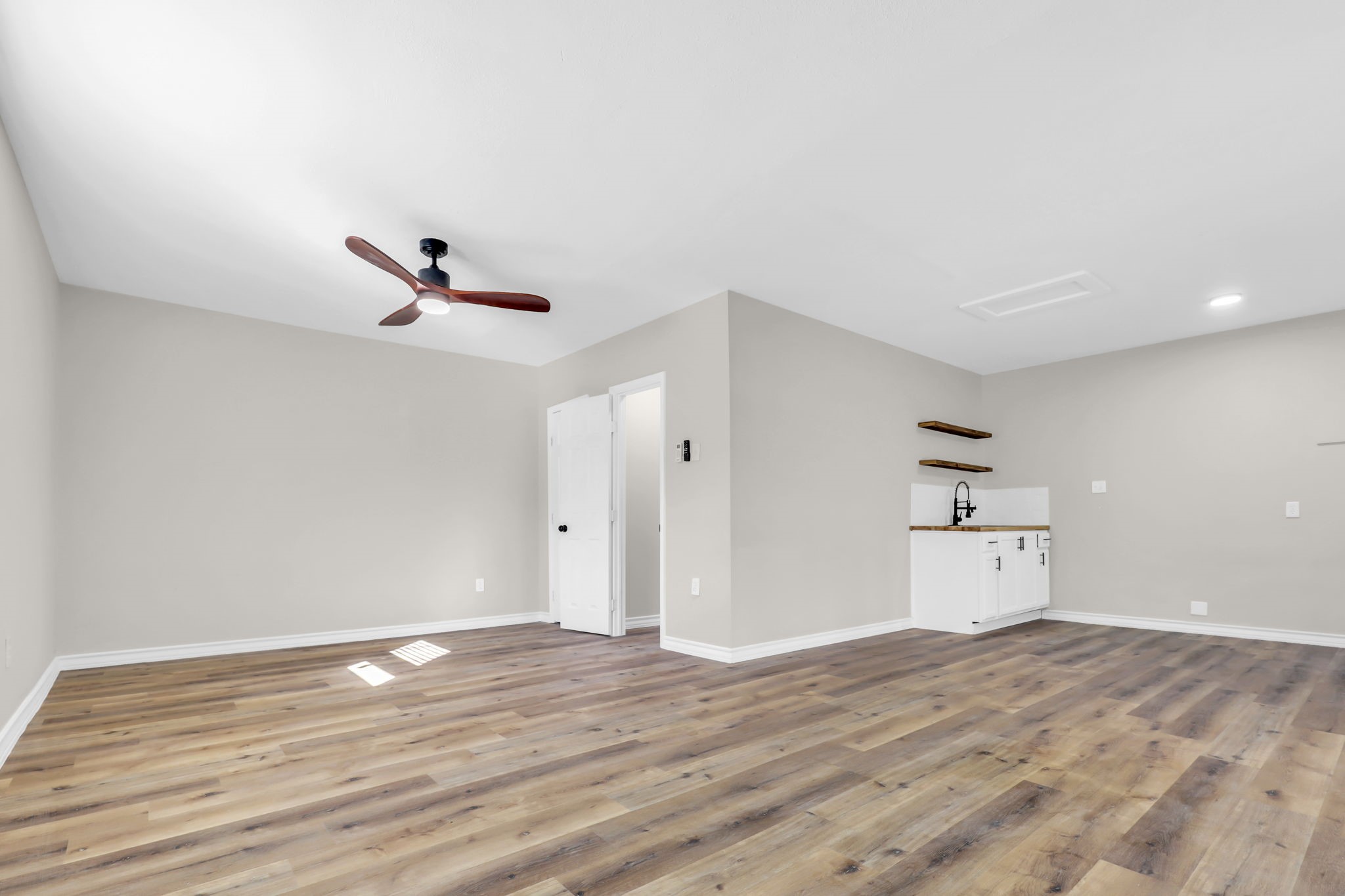 12106 Giusti Lane Santa Fe, TX 77510 - Photo 29 of 33 a view of empty room with wooden floor and window