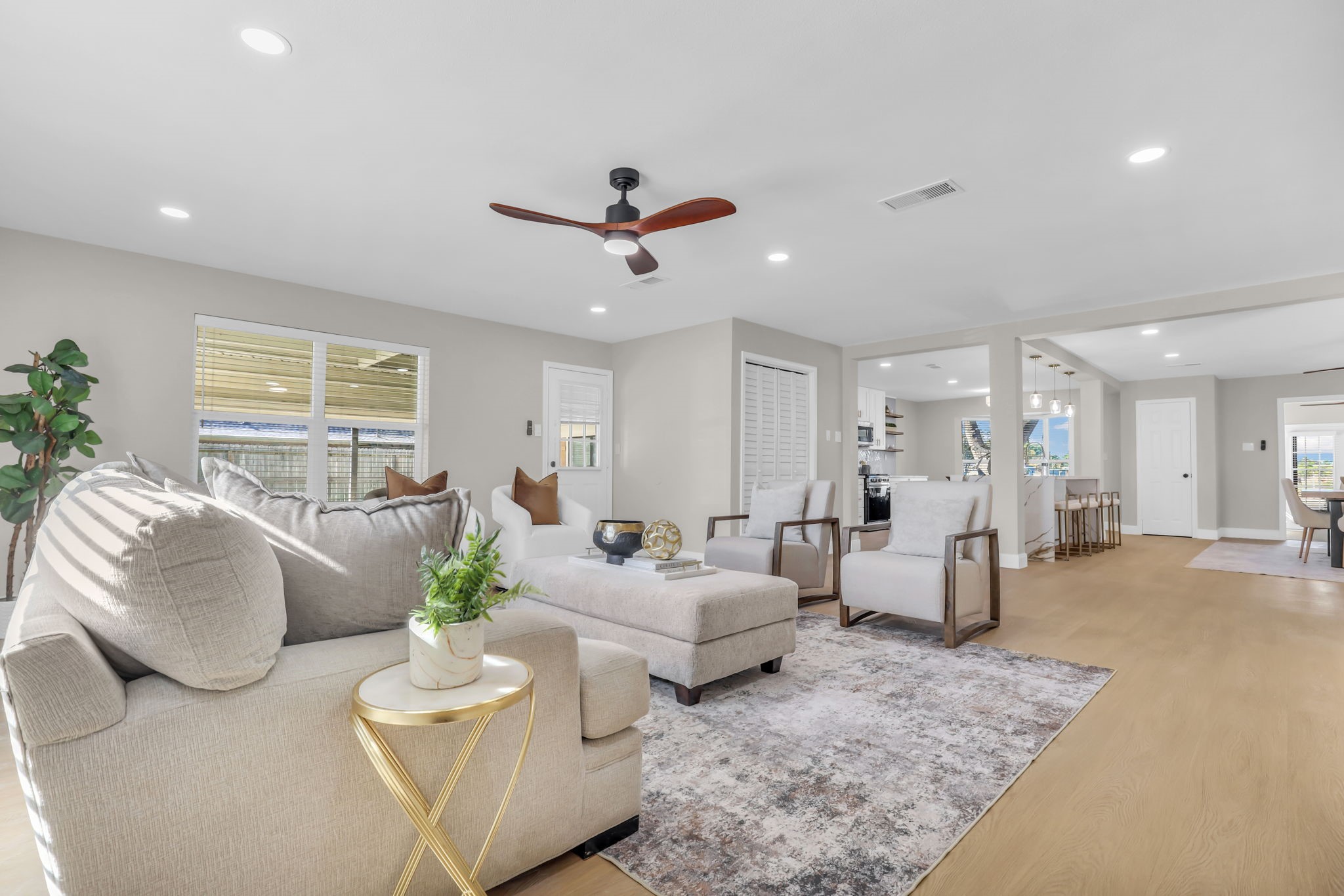 12106 Giusti Lane Santa Fe, TX 77510 - Photo 10 of 33 a living room with furniture and a chandelier