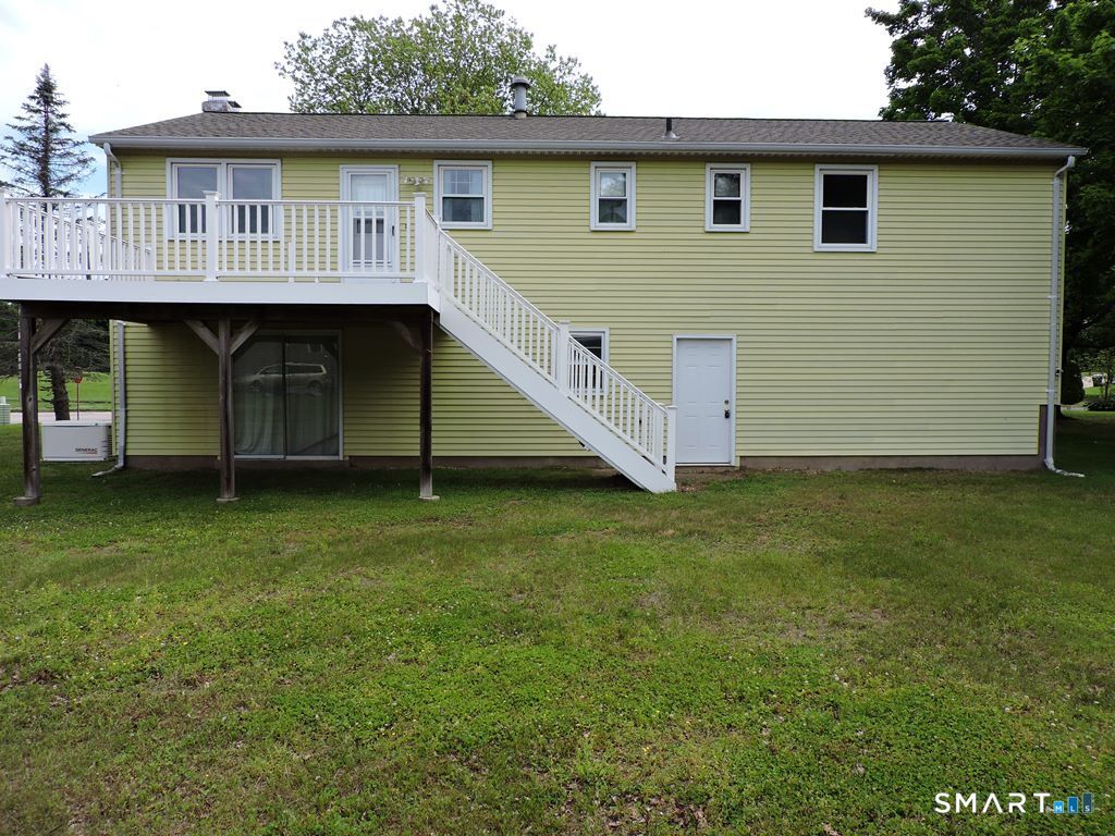 269 Griffin Road South Windsor, CT 06074 - Photo 32 of 36 a front view of a house with a garden