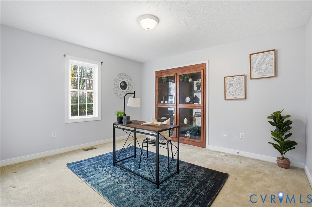 8420 Lee Davis Road Mechanicsville, VA 23116 - Photo 14 of 42 a work room with furniture and window
