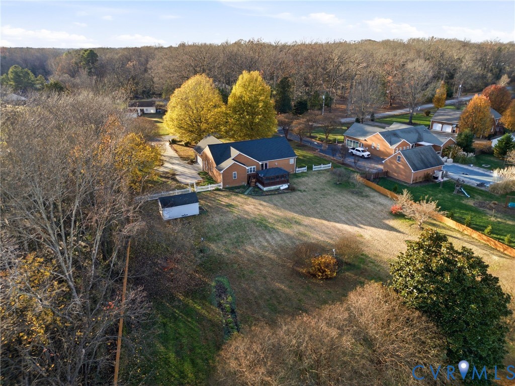 8420 Lee Davis Road Mechanicsville, VA 23116 - Photo 41 of 42 a backyard of a house with table and chairs