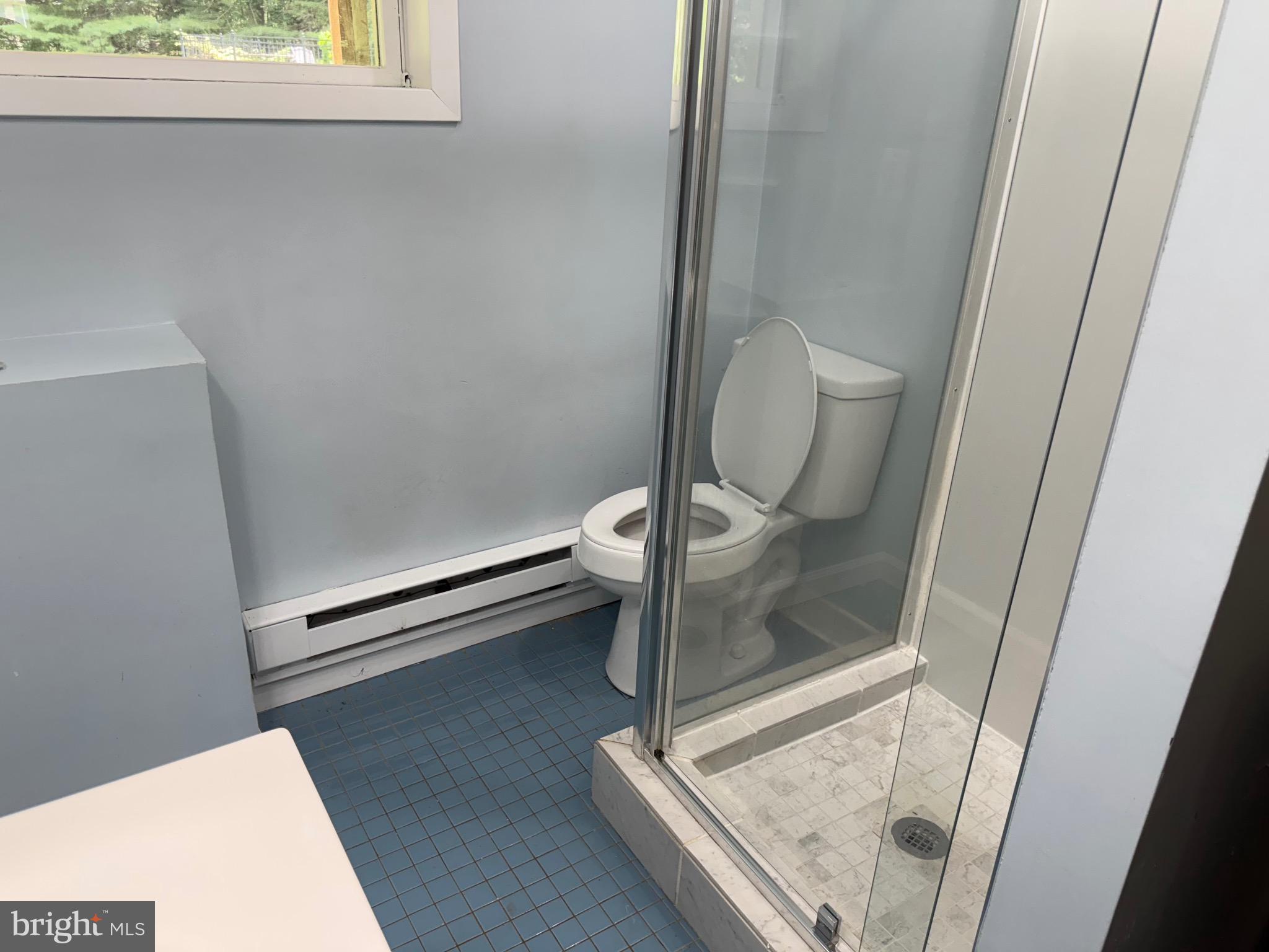 3399 Murray Road Finksburg, MD 21048 - Photo 19 of 27 a bathroom with a sink and mirror