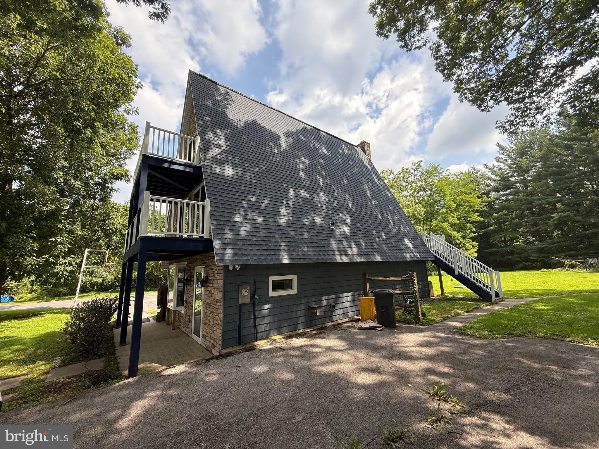 3399 Murray Road Finksburg, MD 21048 - Photo 3 of 27 a front view of a house with a yard and garage