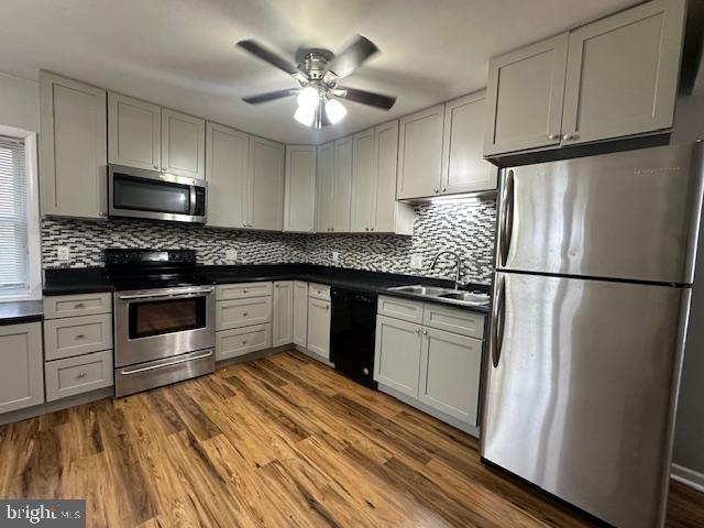 3399 Murray Road Finksburg, MD 21048 - Photo 5 of 27 a kitchen with stainless steel appliances granite countertop a refrigerator a stove a sink and a microwave