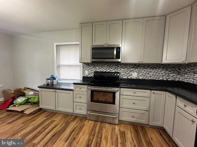 3399 Murray Road Finksburg, MD 21048 - Photo 6 of 27 a kitchen with granite countertop a sink and a stove top oven