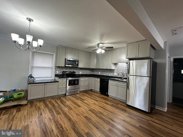 3399 Murray Road Finksburg, MD 21048 - Photo 7 of 27 a kitchen with a refrigerator and a stove top oven