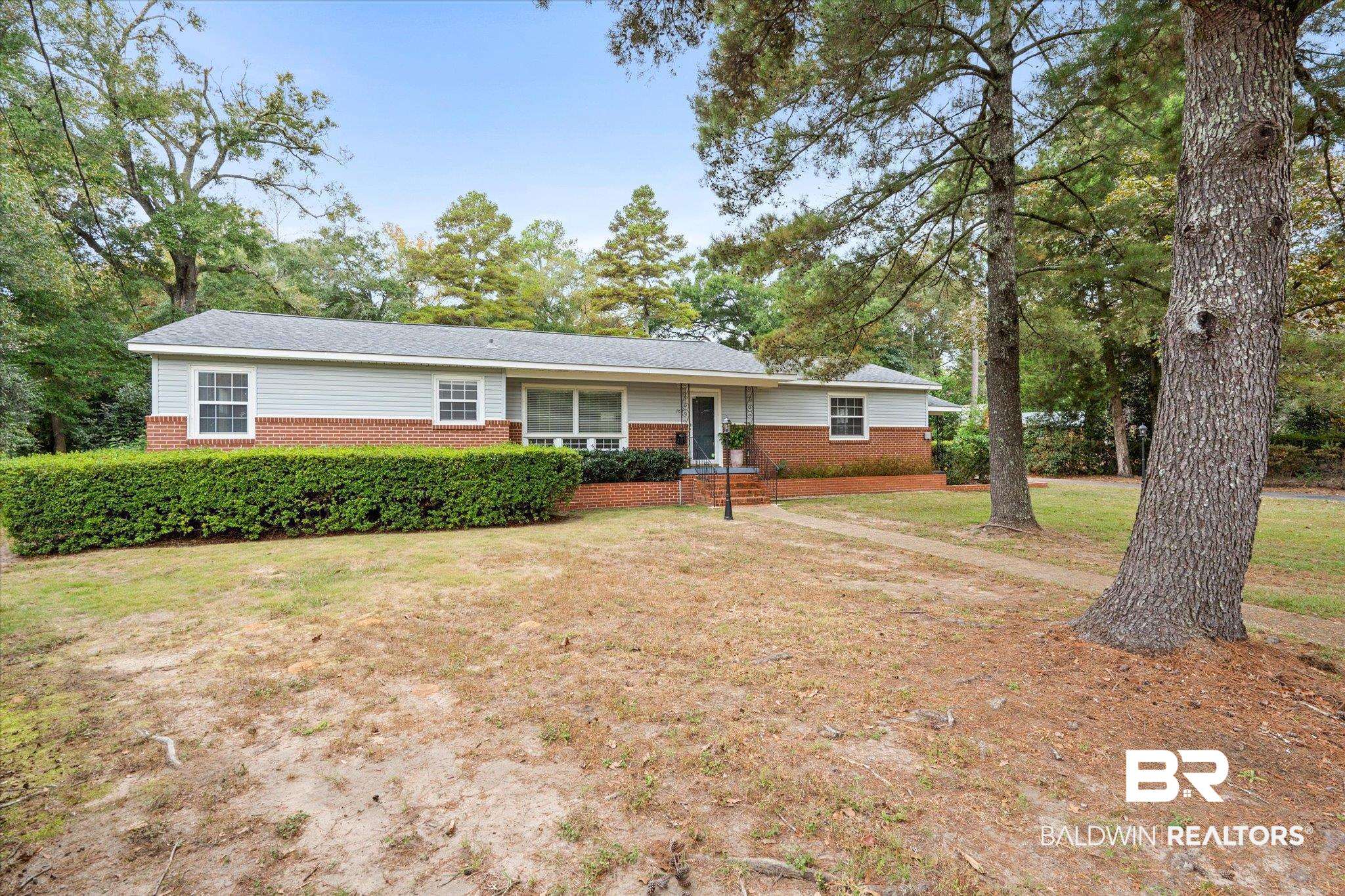 162 Bit And Spur Terrace Mobile, AL 36608 - Photo 29 of 29 Ranch-style house featuring a front lawn