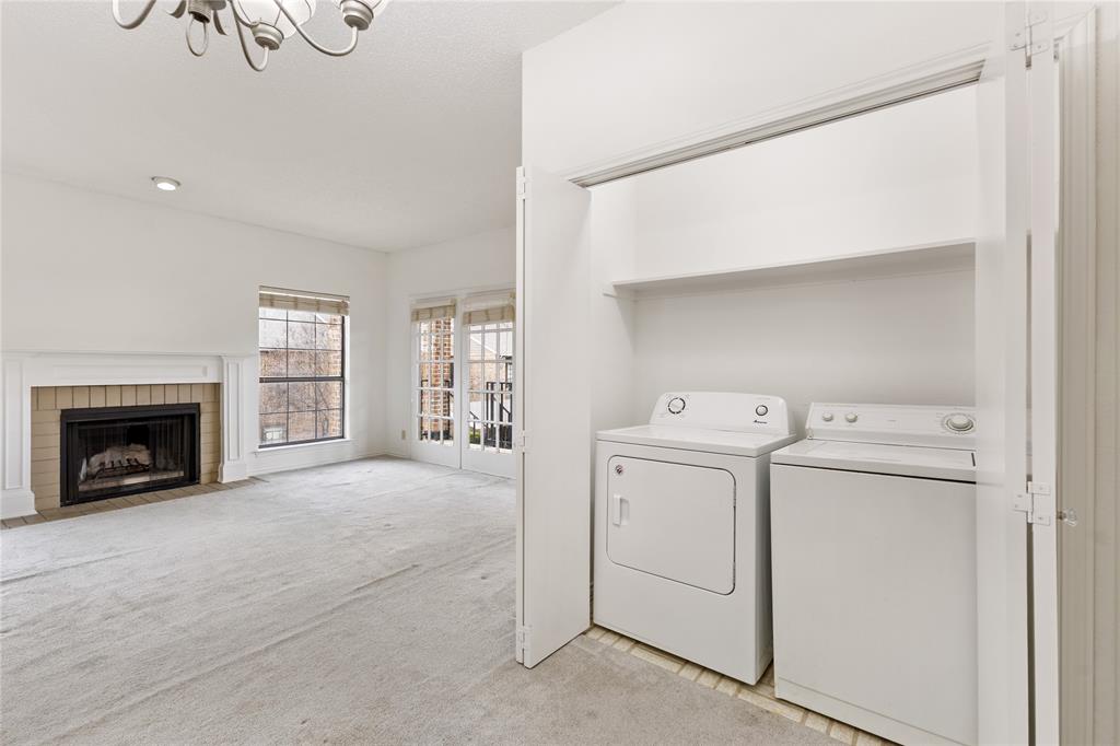 5859 Frankford Road, Unit 812 Dallas, TX 75252 - Photo 12 of 29 a view of a hallway with washer and dryer