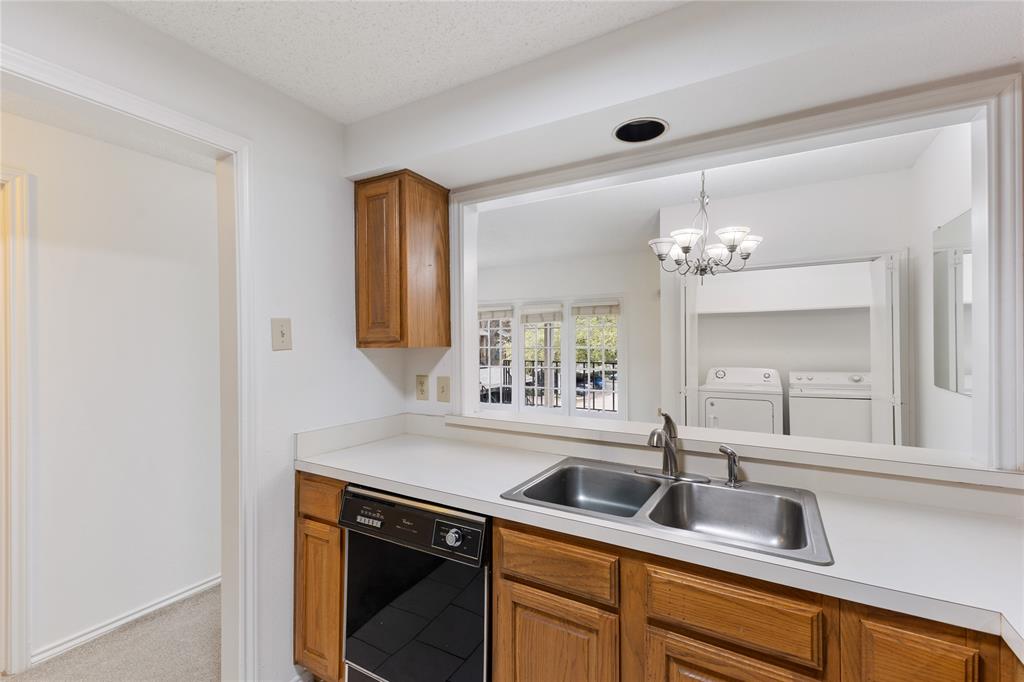 5859 Frankford Road, Unit 812 Dallas, TX 75252 - Photo 15 of 29 a kitchen with a sink and a window