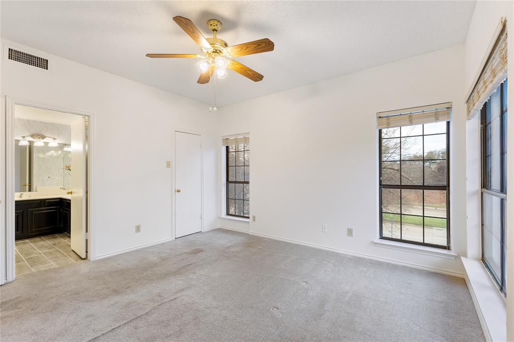 5859 Frankford Road, Unit 812 Dallas, TX 75252 - Photo 20 of 29 an empty room with windows and closet