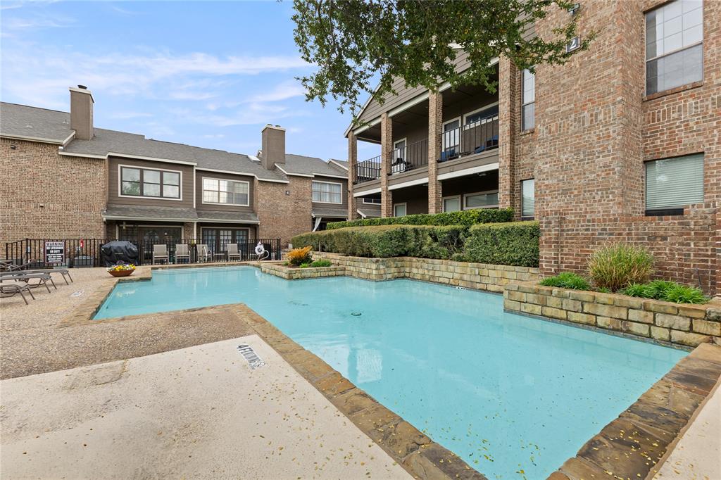 5859 Frankford Road, Unit 812 Dallas, TX 75252 - Photo 25 of 29 a front view of a house with swimming pool having outdoor seating