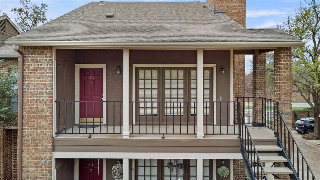 5859 Frankford Road, Unit 812 Dallas, TX 75252 - Photo 3 of 29 a front view of a house with a porch