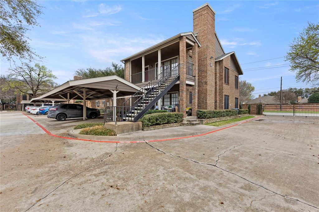 5859 Frankford Road, Unit 812 Dallas, TX 75252 - Photo 4 of 29 a front view of a house with a yard