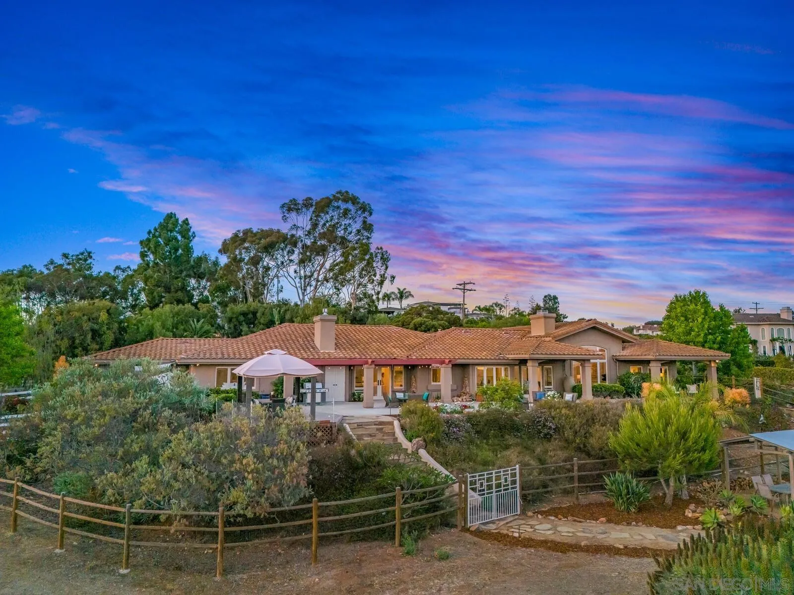 3620 Dove Hollow Road Encinitas, CA 92024 - Photo 1 of 75 a front view of a house with a yard