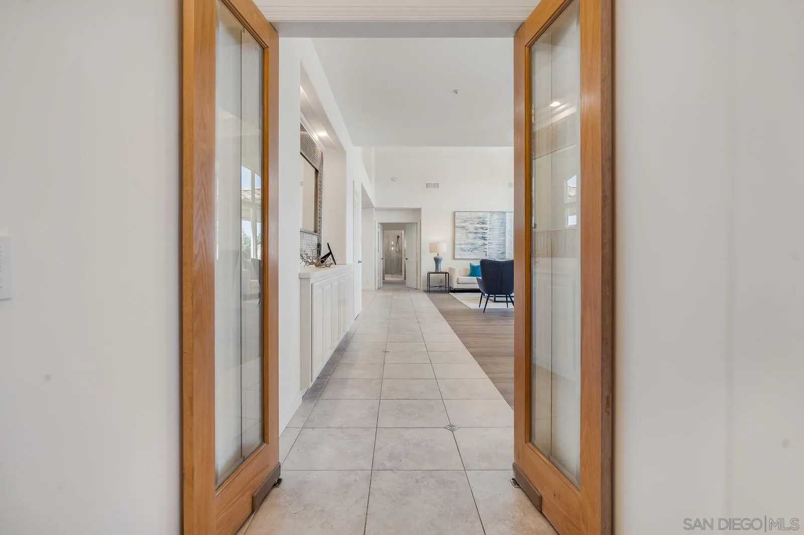 3620 Dove Hollow Road Encinitas, CA 92024 - Photo 12 of 75 a view of a hallway with a livingroom and a bathroom with sink
