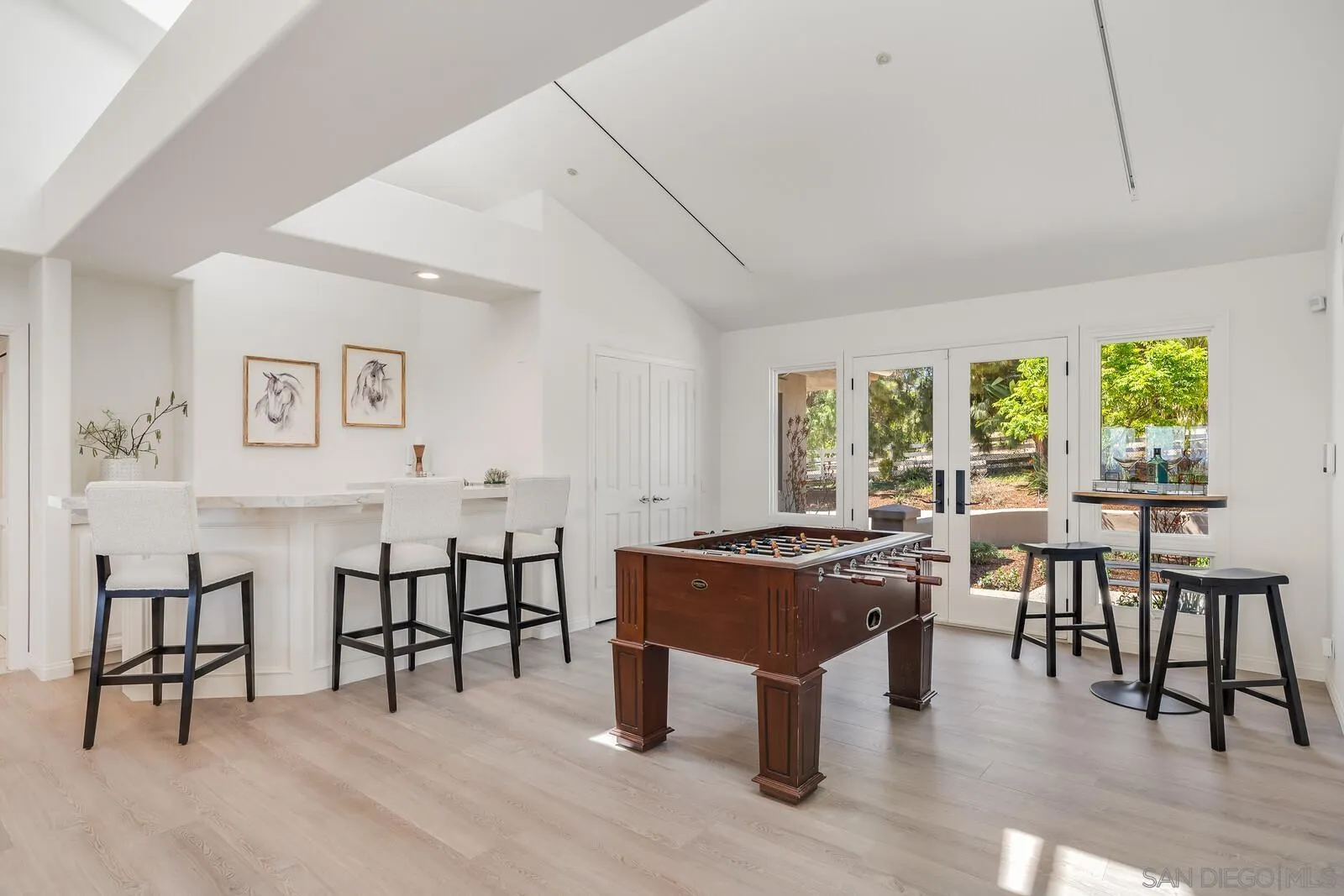 3620 Dove Hollow Road Encinitas, CA 92024 - Photo 22 of 75 a view of a dining room with furniture window and wooden floor