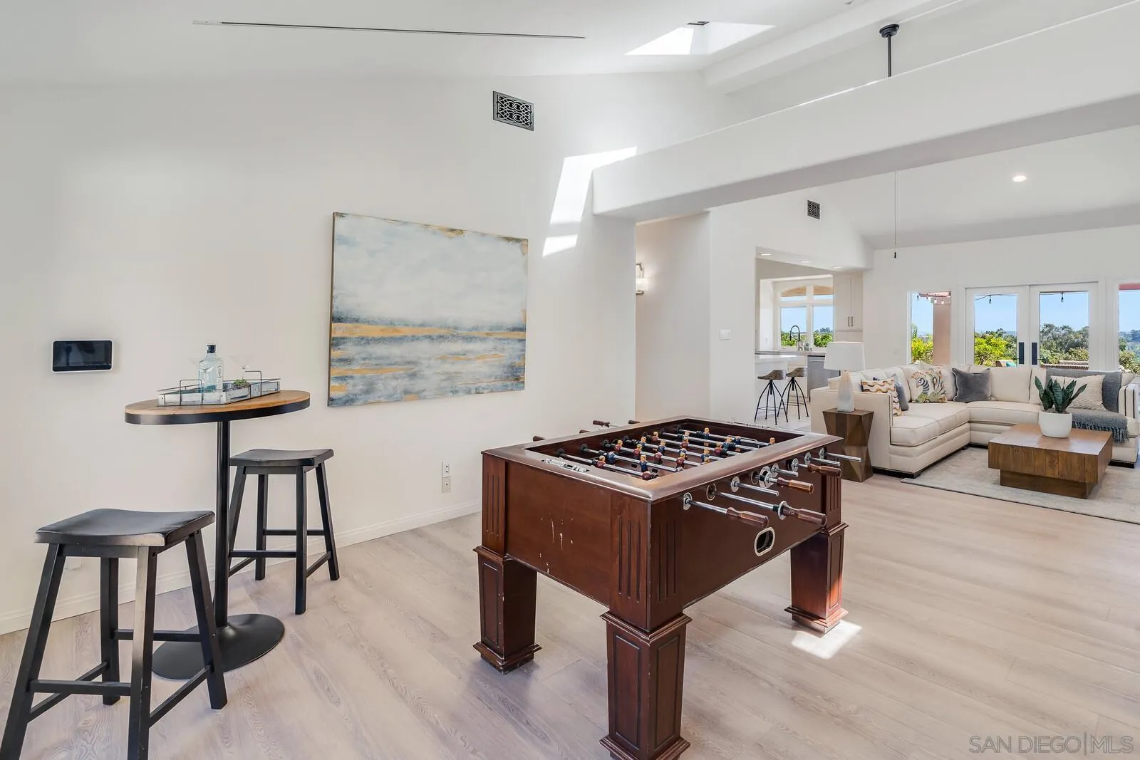 3620 Dove Hollow Road Encinitas, CA 92024 - Photo 24 of 75 a living room with furniture a rug and a table