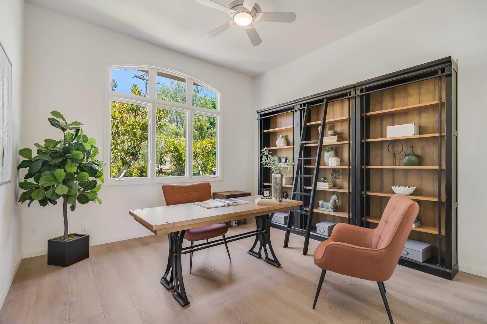 3620 Dove Hollow Road Encinitas, CA 92024 - Photo 35 of 75 a living room with furniture and a potted plant