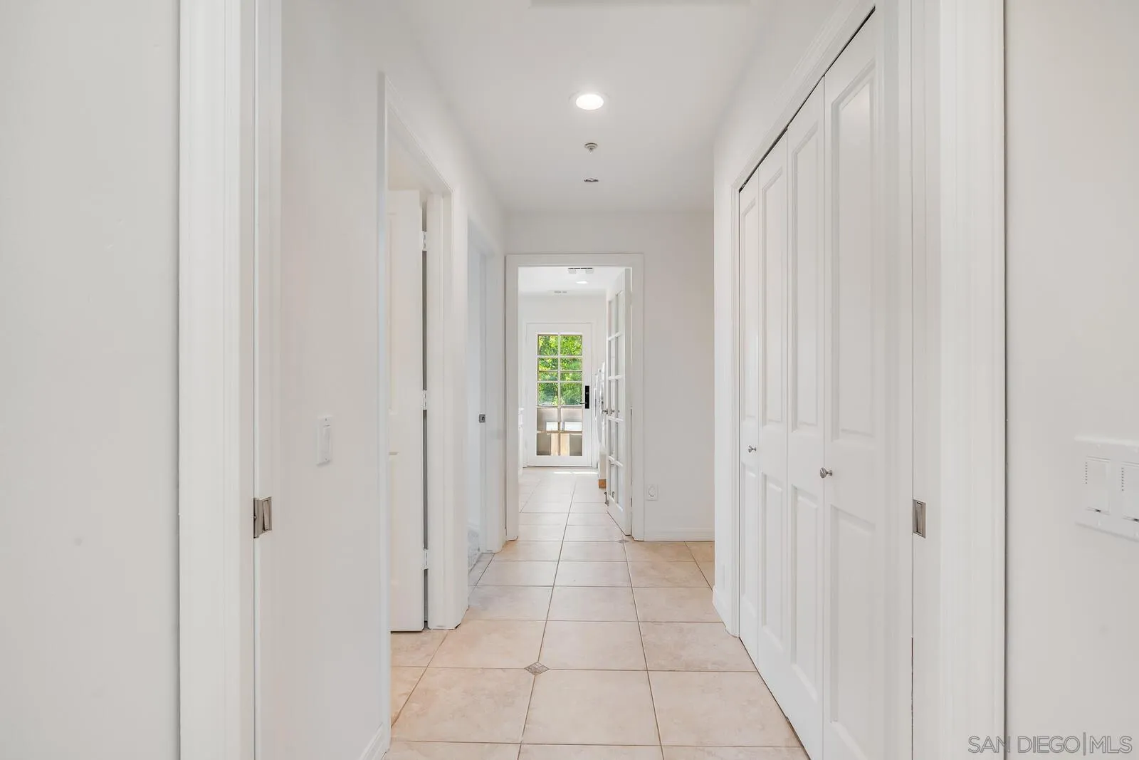 3620 Dove Hollow Road Encinitas, CA 92024 - Photo 38 of 75 a view of a hallway with wooden floor and closet area