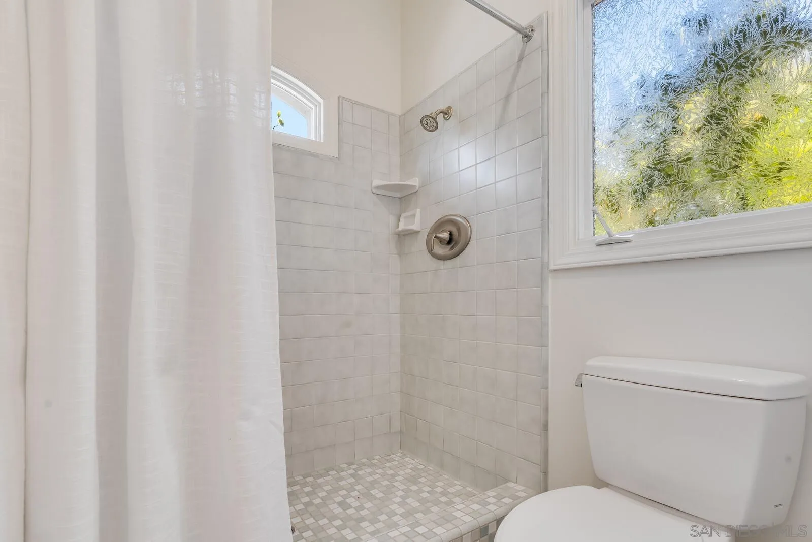 3620 Dove Hollow Road Encinitas, CA 92024 - Photo 45 of 75 a bathroom with a toilet and a shower