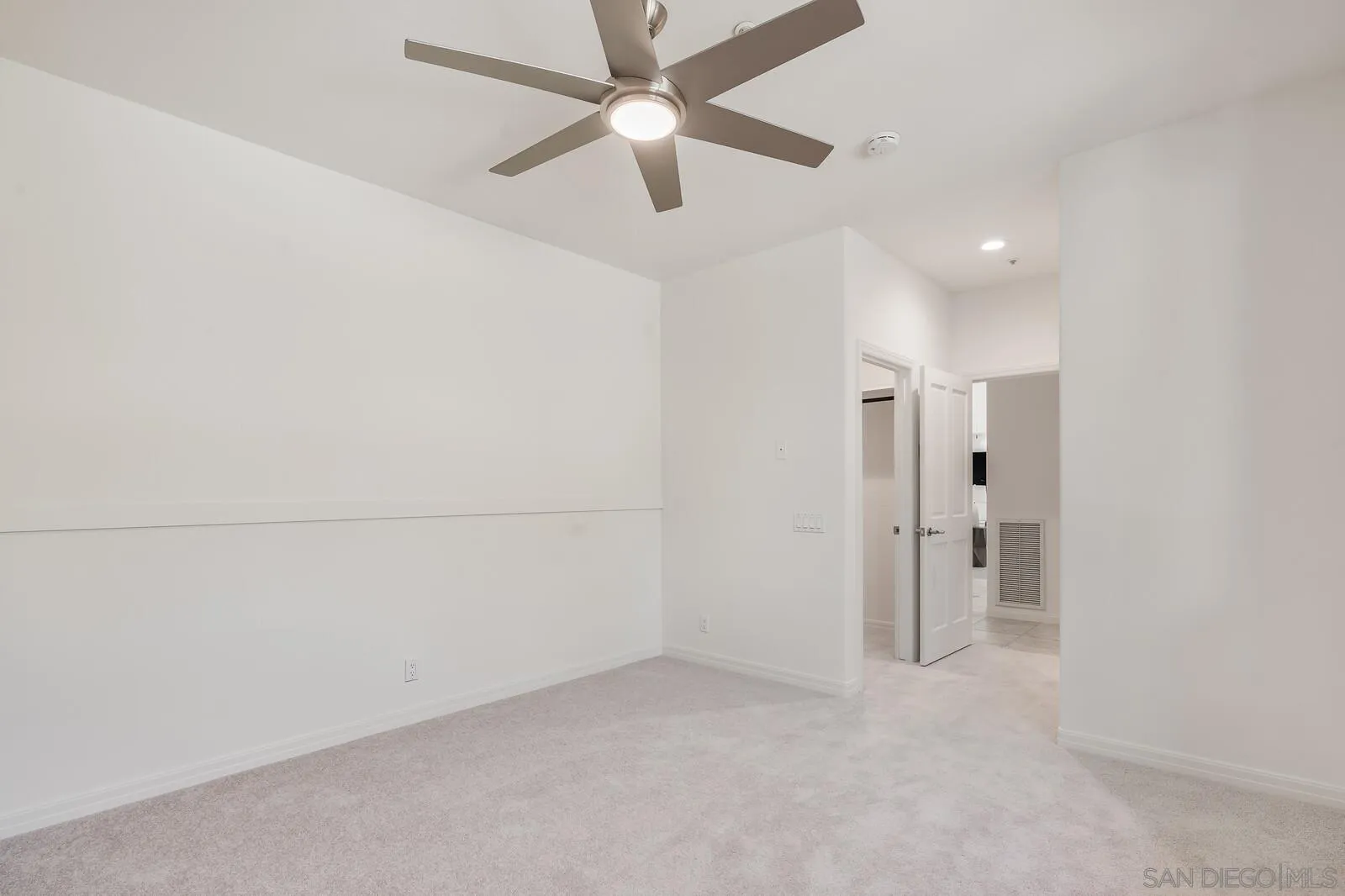 3620 Dove Hollow Road Encinitas, CA 92024 - Photo 46 of 75 an empty room with a ceiling fan and a ceiling fan
