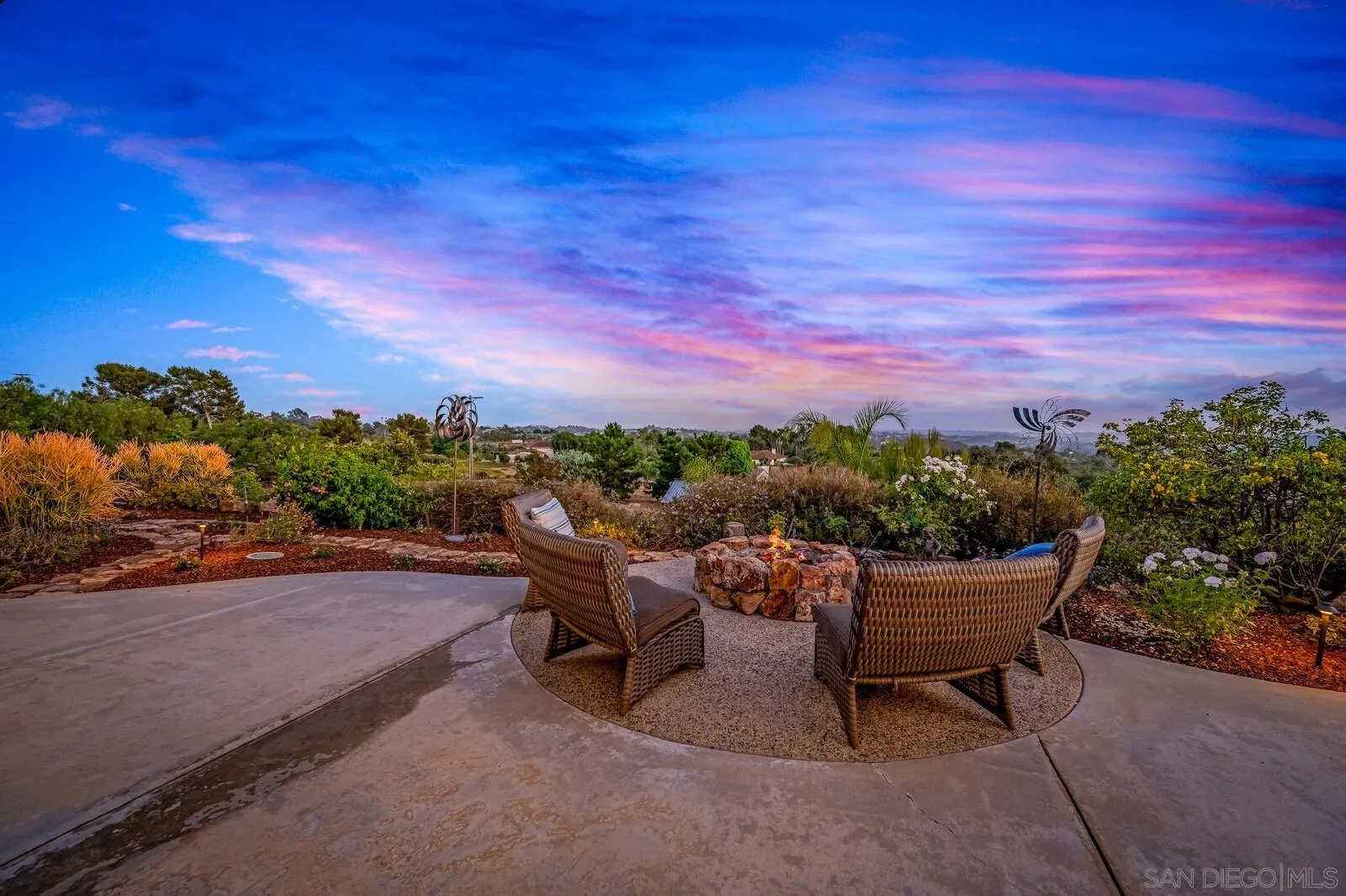 3620 Dove Hollow Road Encinitas, CA 92024 - Photo 60 of 75 a roof deck with table and chairs