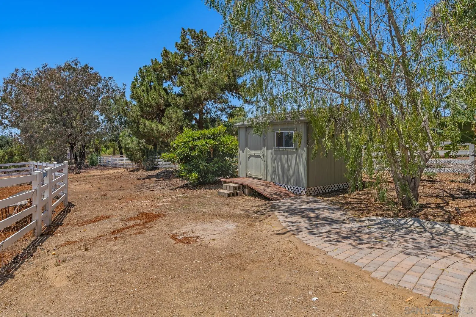 3620 Dove Hollow Road Encinitas, CA 92024 - Photo 64 of 75 a view of a house with a yard