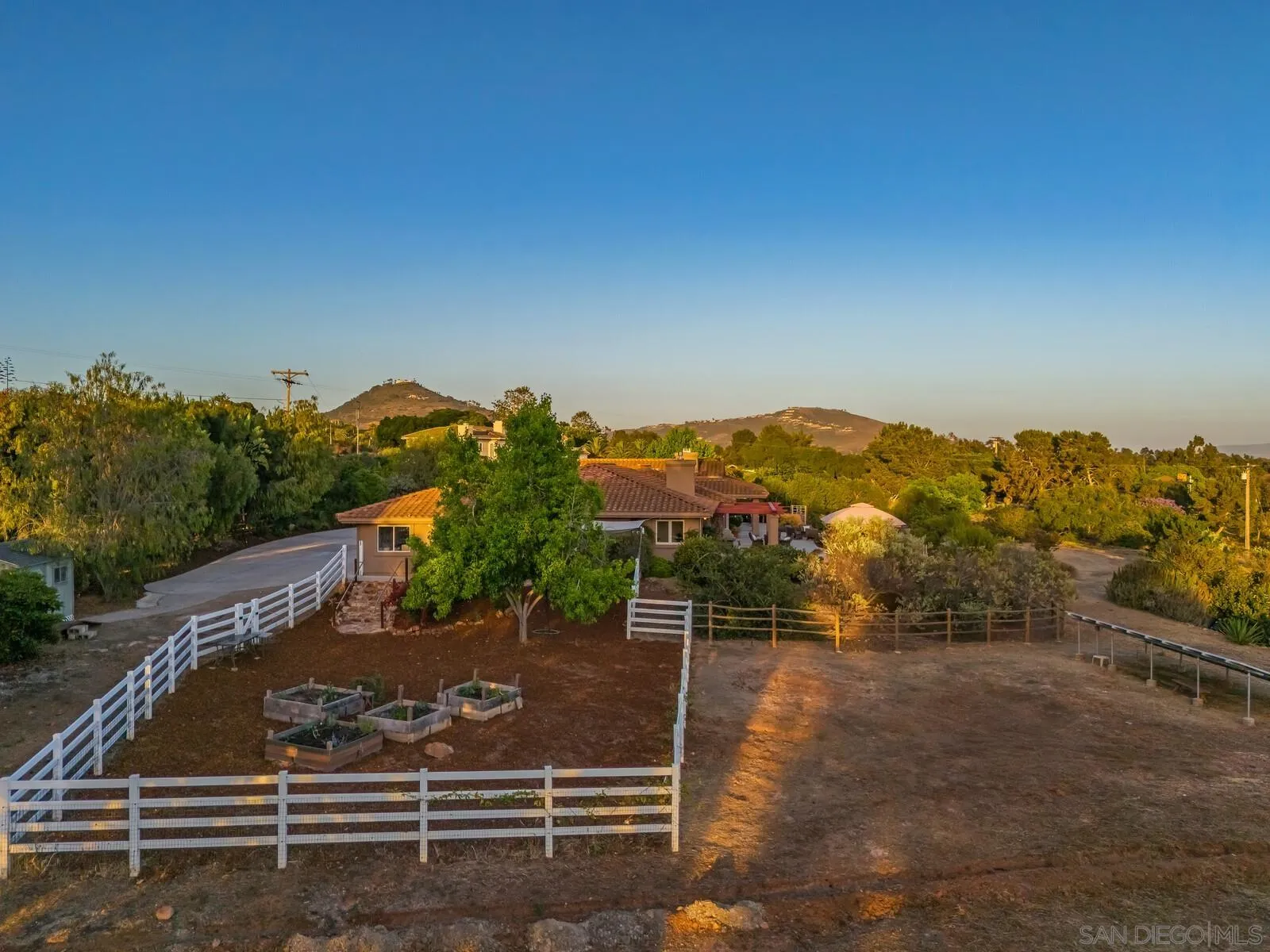 3620 Dove Hollow Road Encinitas, CA 92024 - Photo 67 of 75 a view of a street with a building in the background