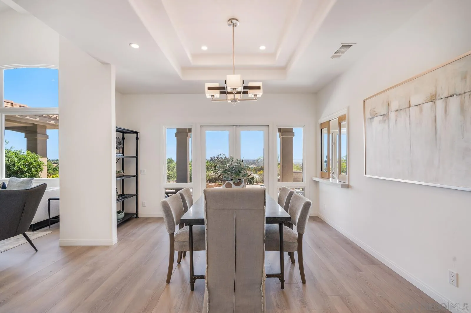 3620 Dove Hollow Road Encinitas, CA 92024 - Photo 9 of 75 a view of a dining room with furniture window and wooden floor