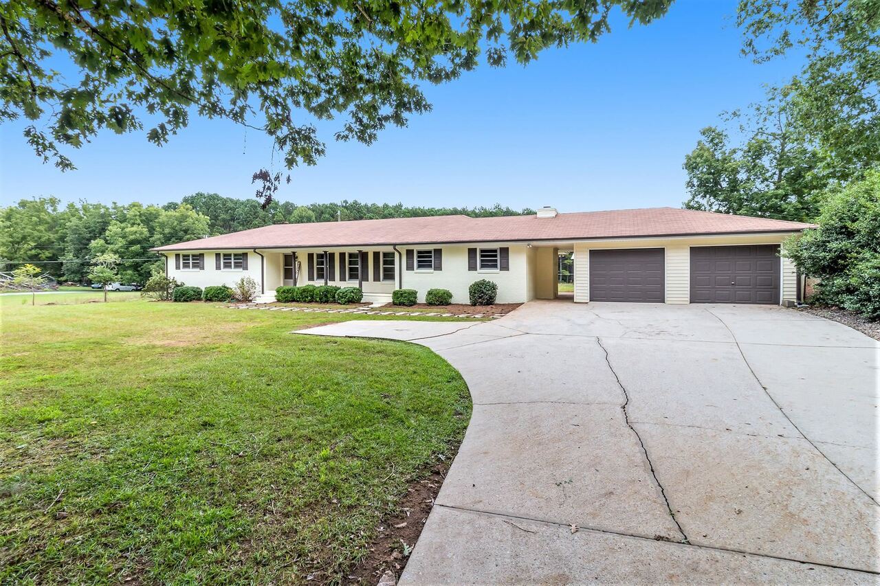 1119 Malier Road Hampton, GA 30228 - Photo 1 of 1 a view of a house with a garden